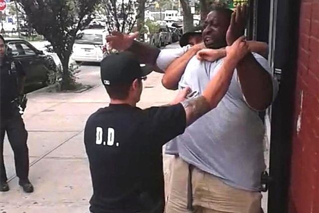 Eric Garner, caught in the fatal chokehold that Officer Daniel Pantaleo put him in.